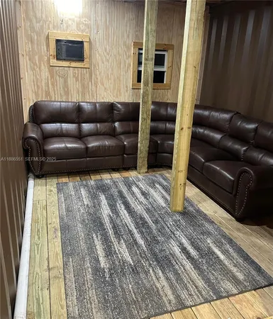 a living room with furniture and a couch