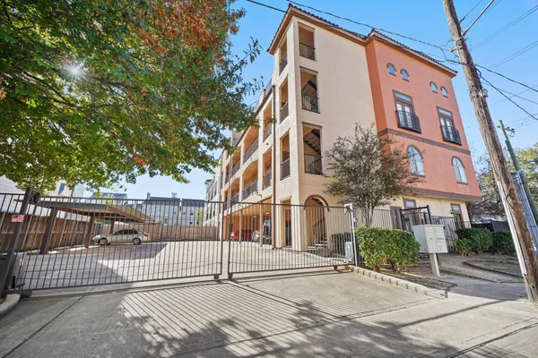 a view of a building with a street