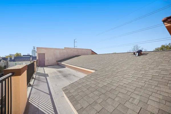 a view of a balcony with city view