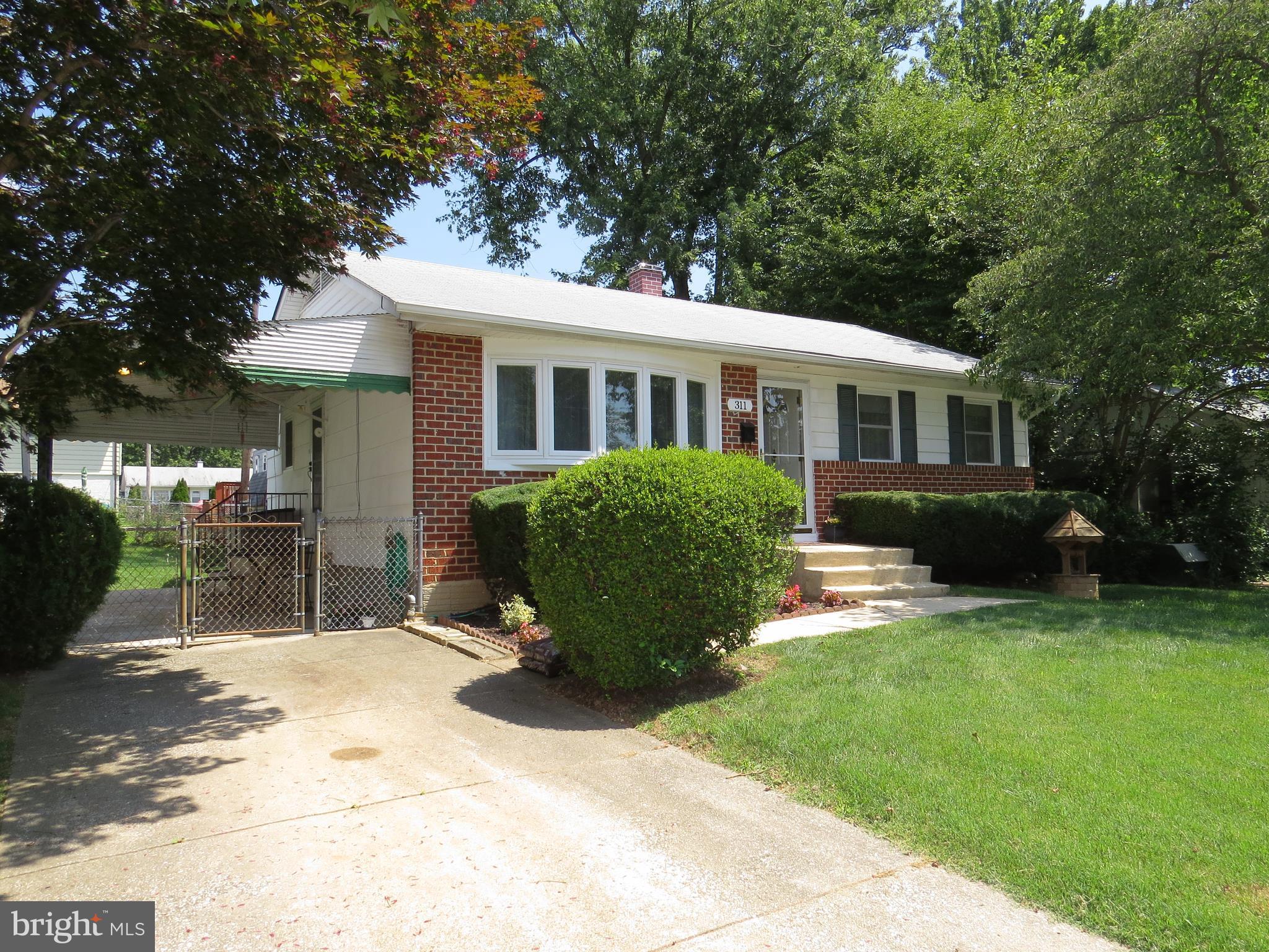 311 Highfalcon Road Reisterstown, MD 21136 - Photo 21 of 24 a view of a house with backyard and sitting area