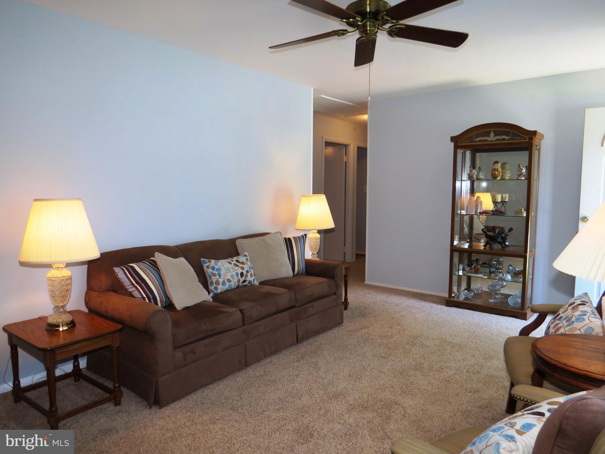 311 Highfalcon Road Reisterstown, MD 21136 - Photo 4 of 24 a living room with furniture and a lamp