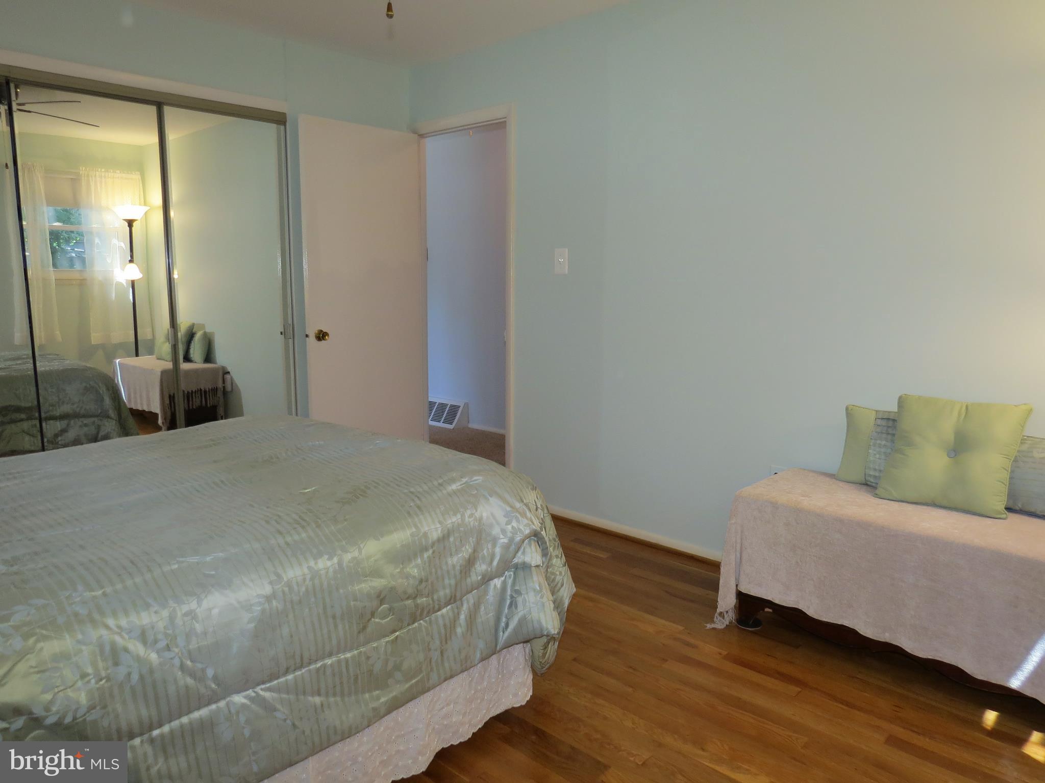 311 Highfalcon Road Reisterstown, MD 21136 - Photo 8 of 24 a bedroom with a bed and a couch