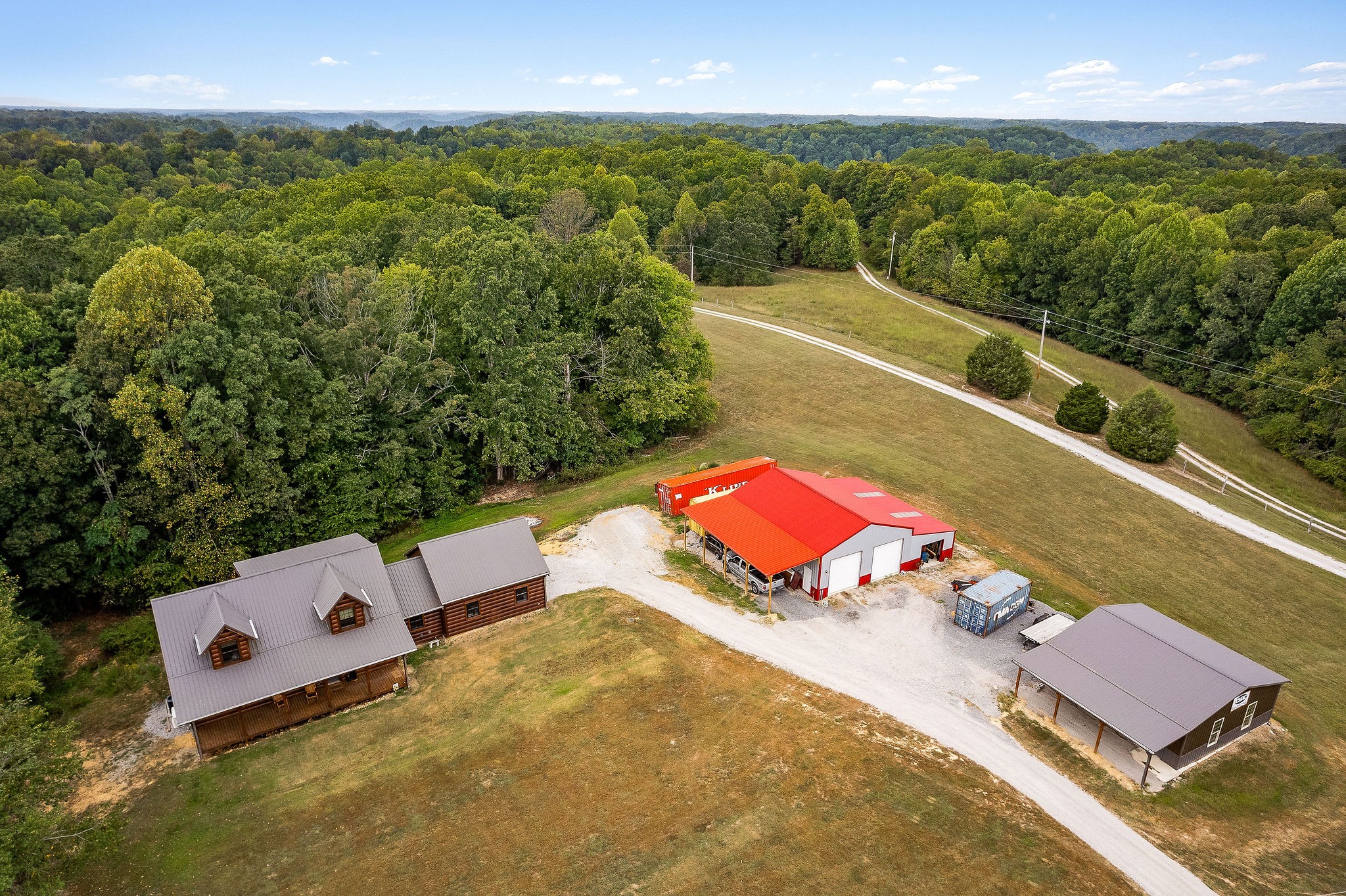6995 Ashburn Road Baxter, TN 38544 - Photo 4 of 61 Log home with the 2 outbuildings