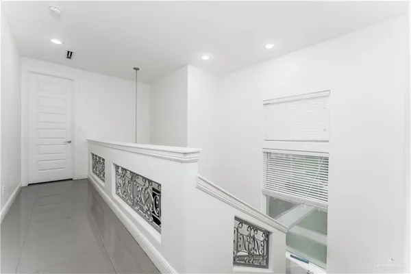 a view of an entryway with stairs