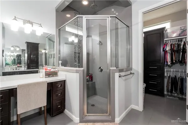 a kitchen with a sink and refrigerator