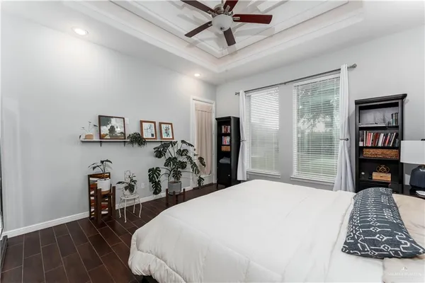 a bedroom with a bed and a table
