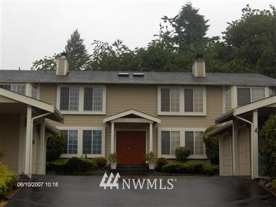3210 Morrison Road West, Unit AD University Place, WA 98466 - Photo 1 of 1 a front view of a house with a garden