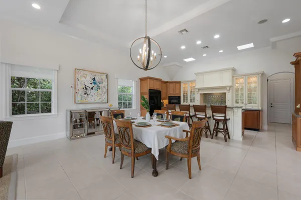 a view of a dining area with furniture window and wooden floor