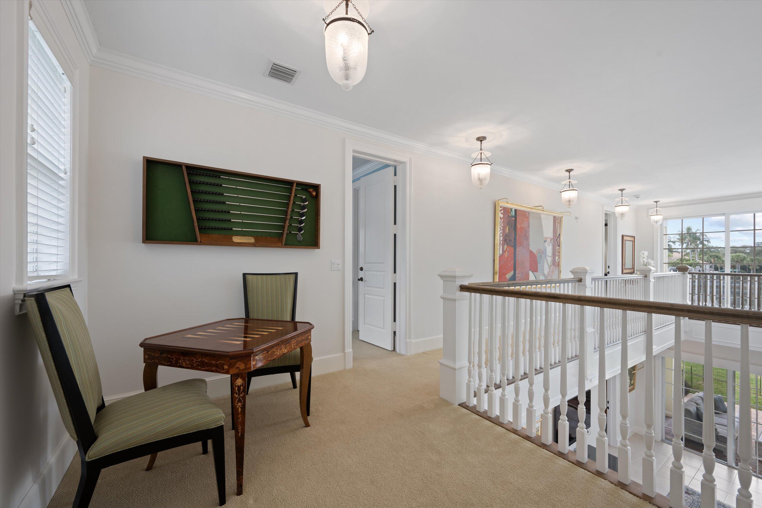 113 Caballo Lane Jupiter, FL 33458 - Photo 29 of 51 a view of a livingroom with furniture and windows