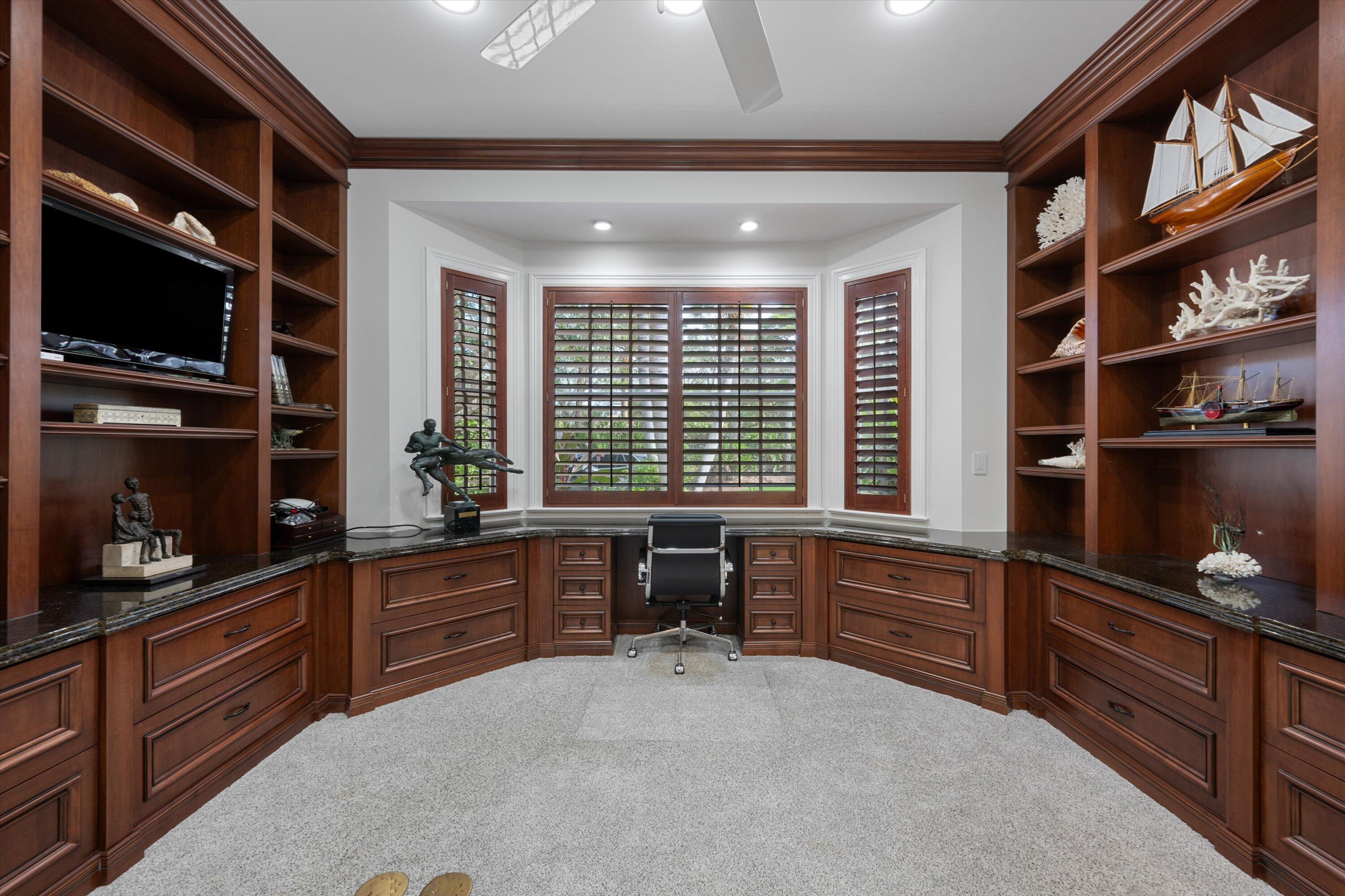 113 Caballo Lane Jupiter, FL 33458 - Photo 31 of 51 a room with furniture cabinets and window