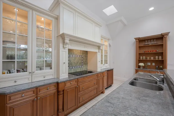 a view of a storage and utility room with windows