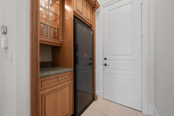 a bathroom with a granite countertop cabinets and a sink