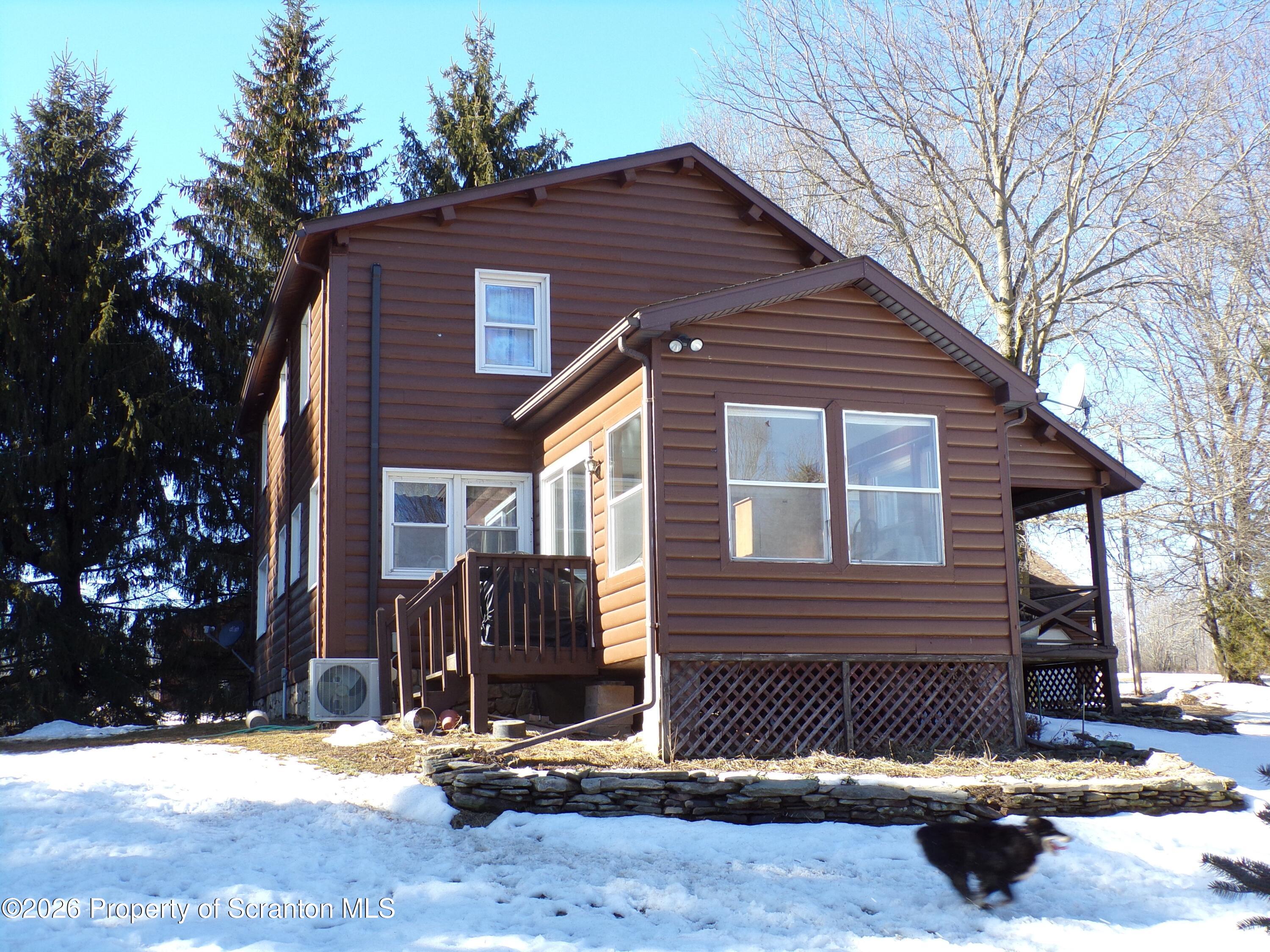 2590 Potter Hill Road Thompson, PA 18465 - Photo 2 of 38 Back