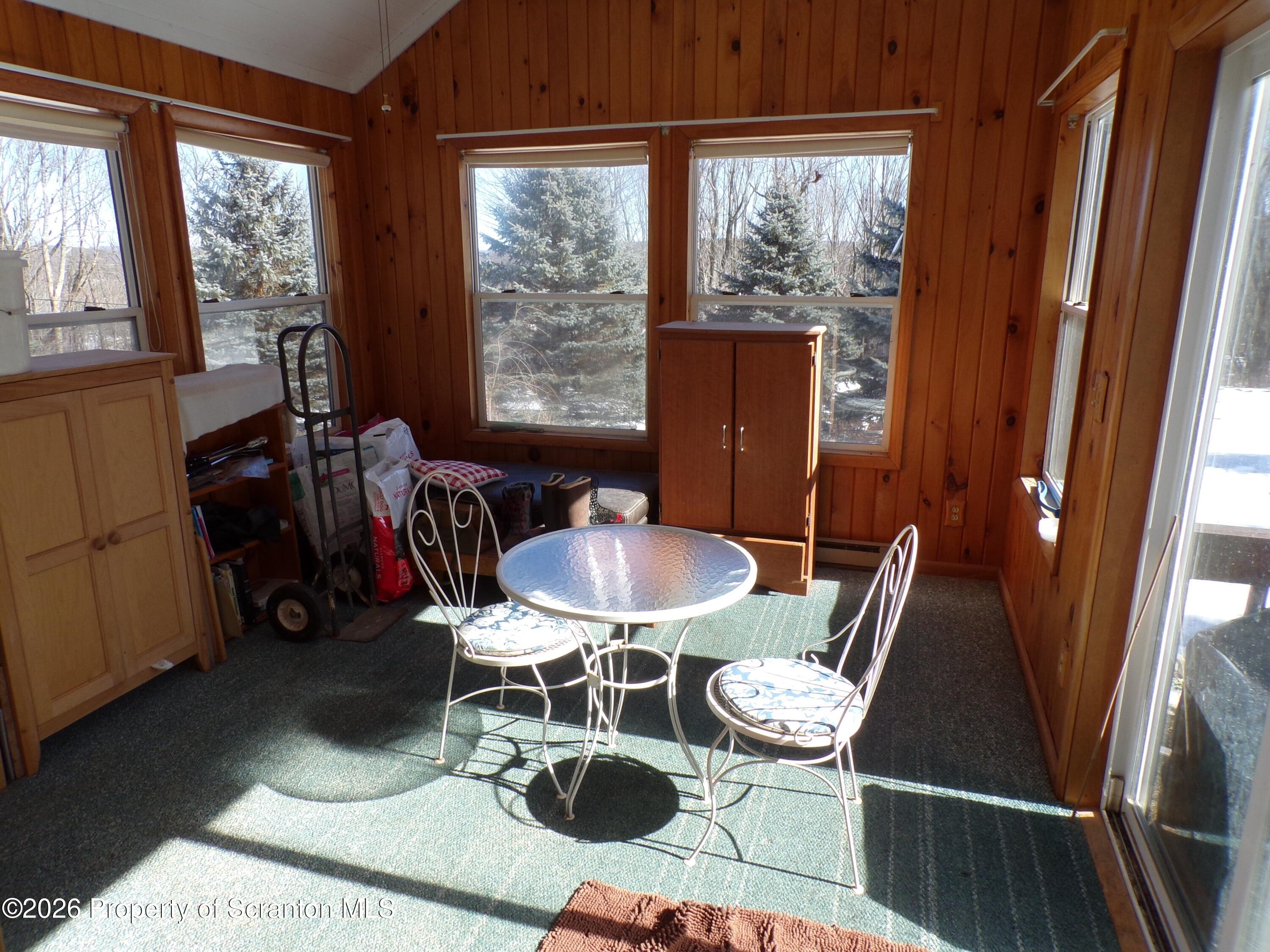 2590 Potter Hill Road Thompson, PA 18465 - Photo 25 of 38 Sunroom