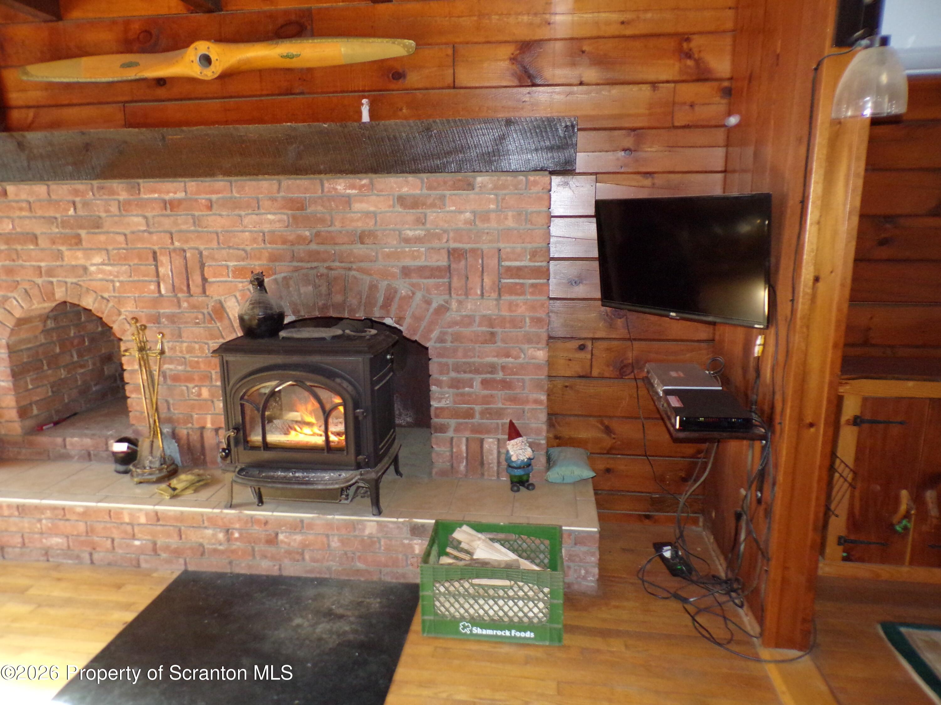 2590 Potter Hill Road Thompson, PA 18465 - Photo 26 of 38 Wood stove