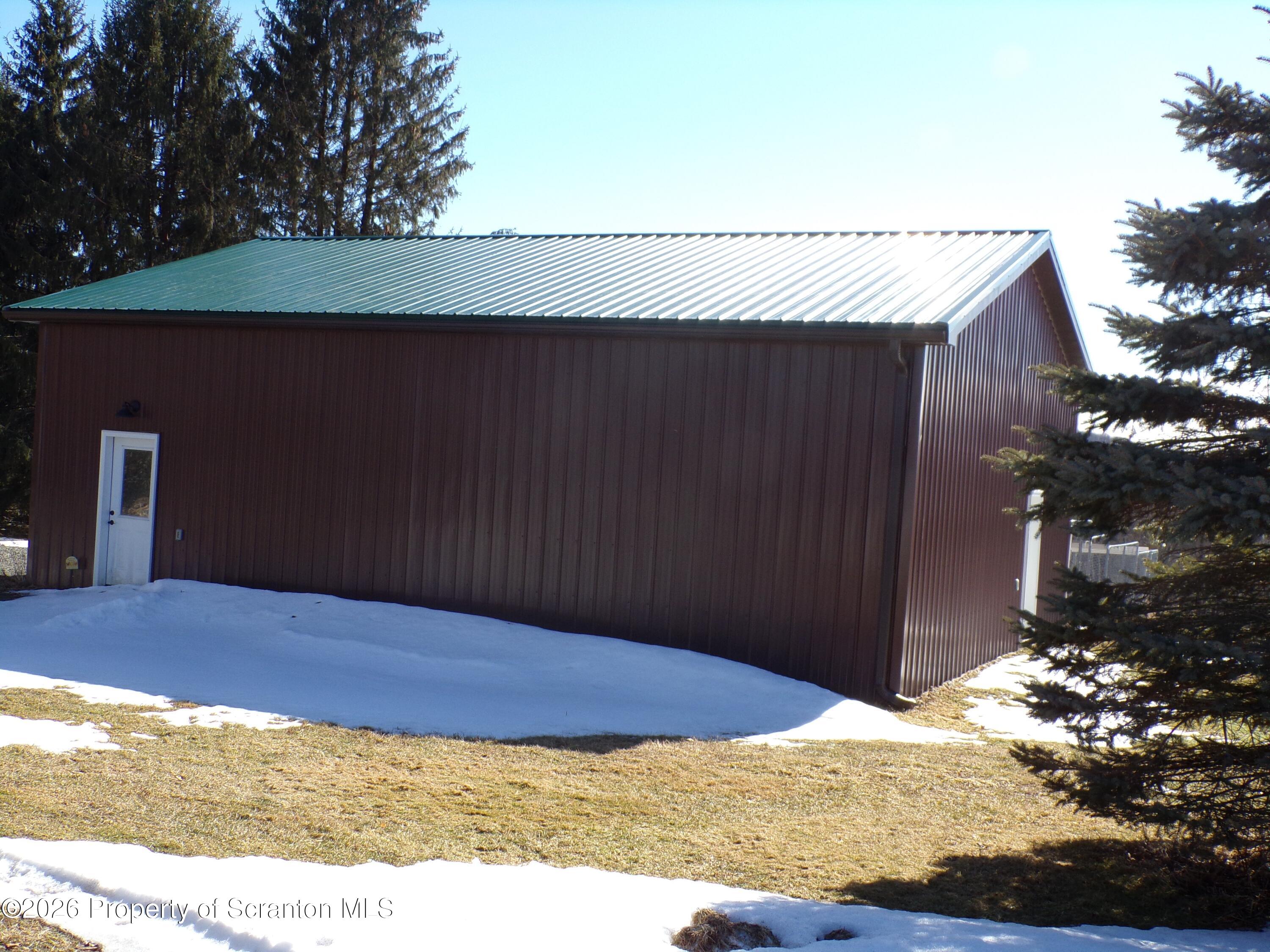 2590 Potter Hill Road Thompson, PA 18465 - Photo 6 of 38 Garage back
