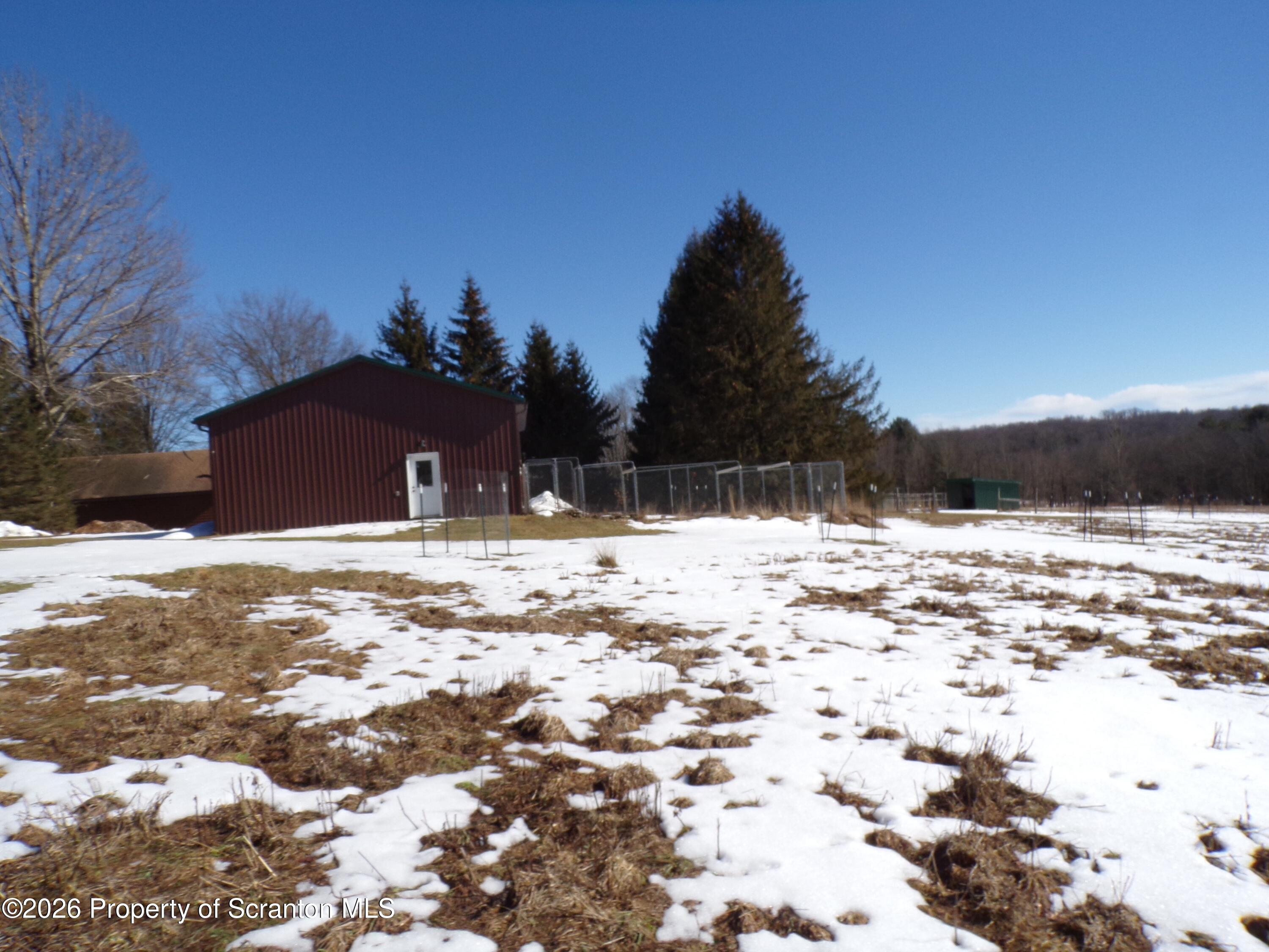 2590 Potter Hill Road Thompson, PA 18465 - Photo 8 of 38 Garage side