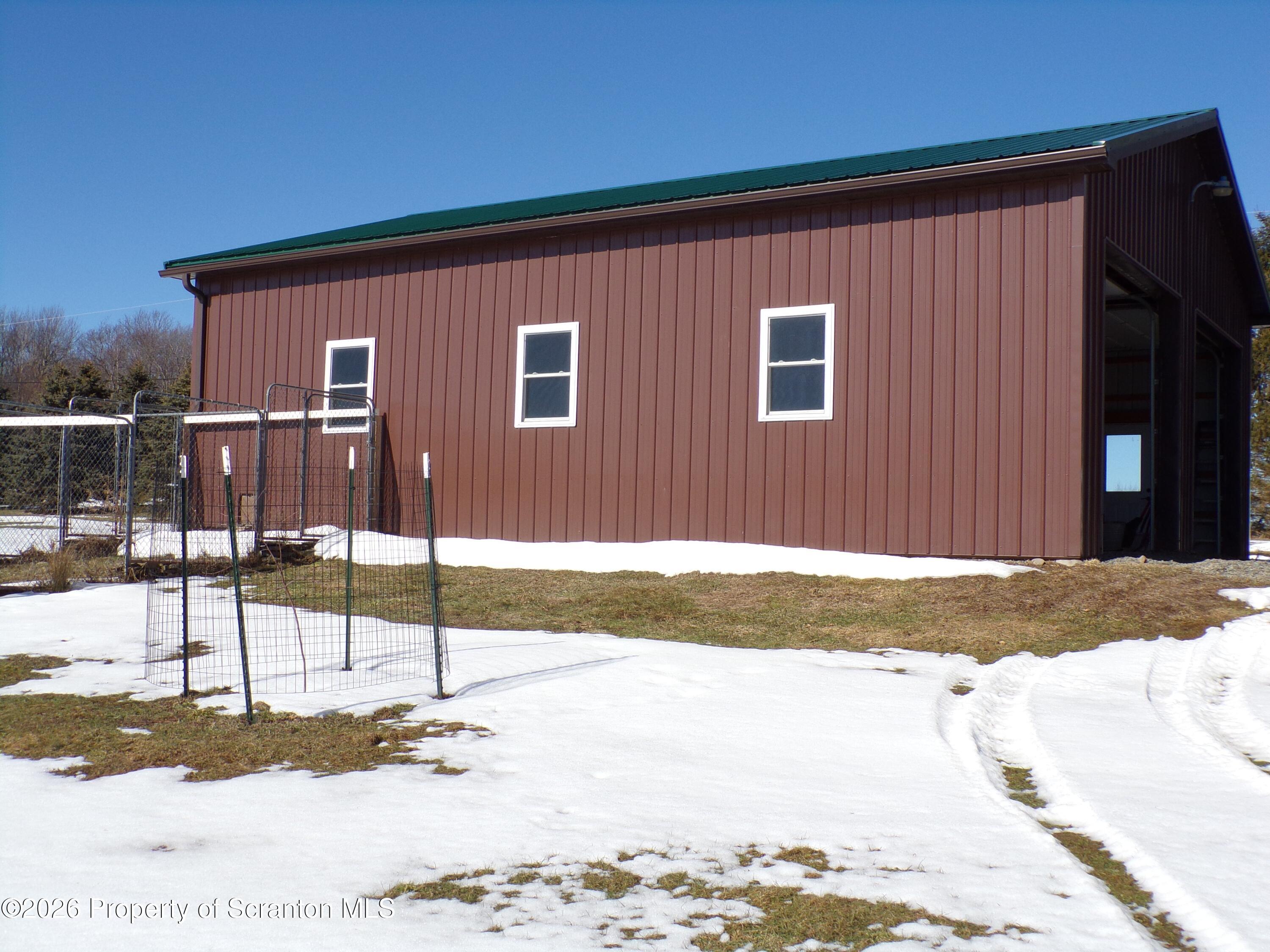 2590 Potter Hill Road Thompson, PA 18465 - Photo 9 of 38 Pole barn left side