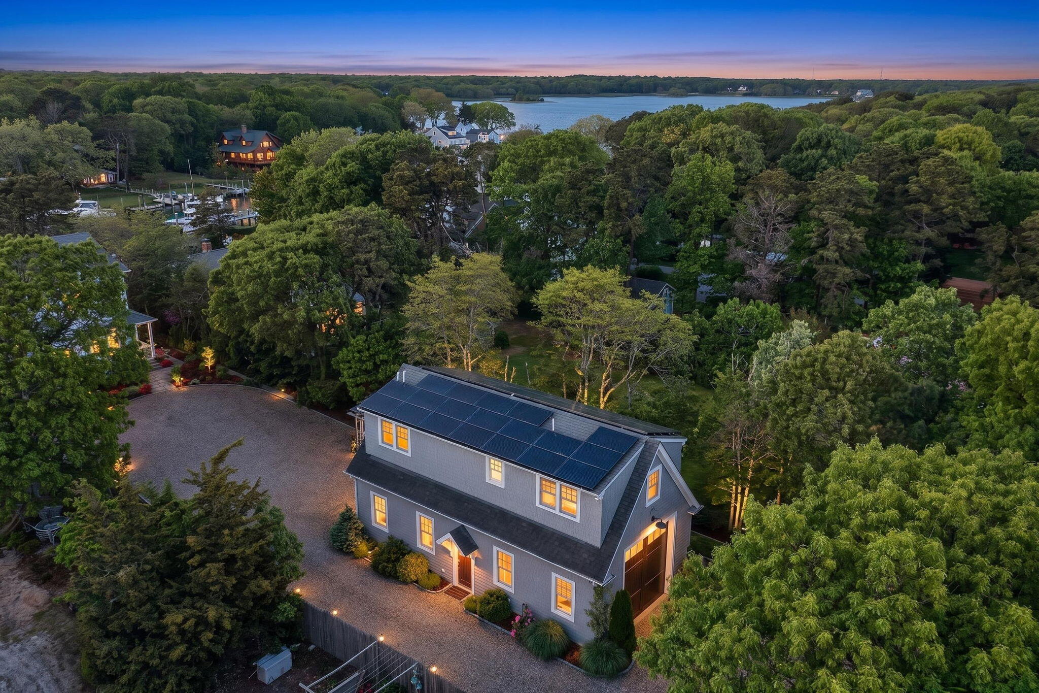 357 Monomoscoy Road Mashpee, MA 02649 - Photo 1 of 40 151-BDJI_20260529210751_0048_D-twilight