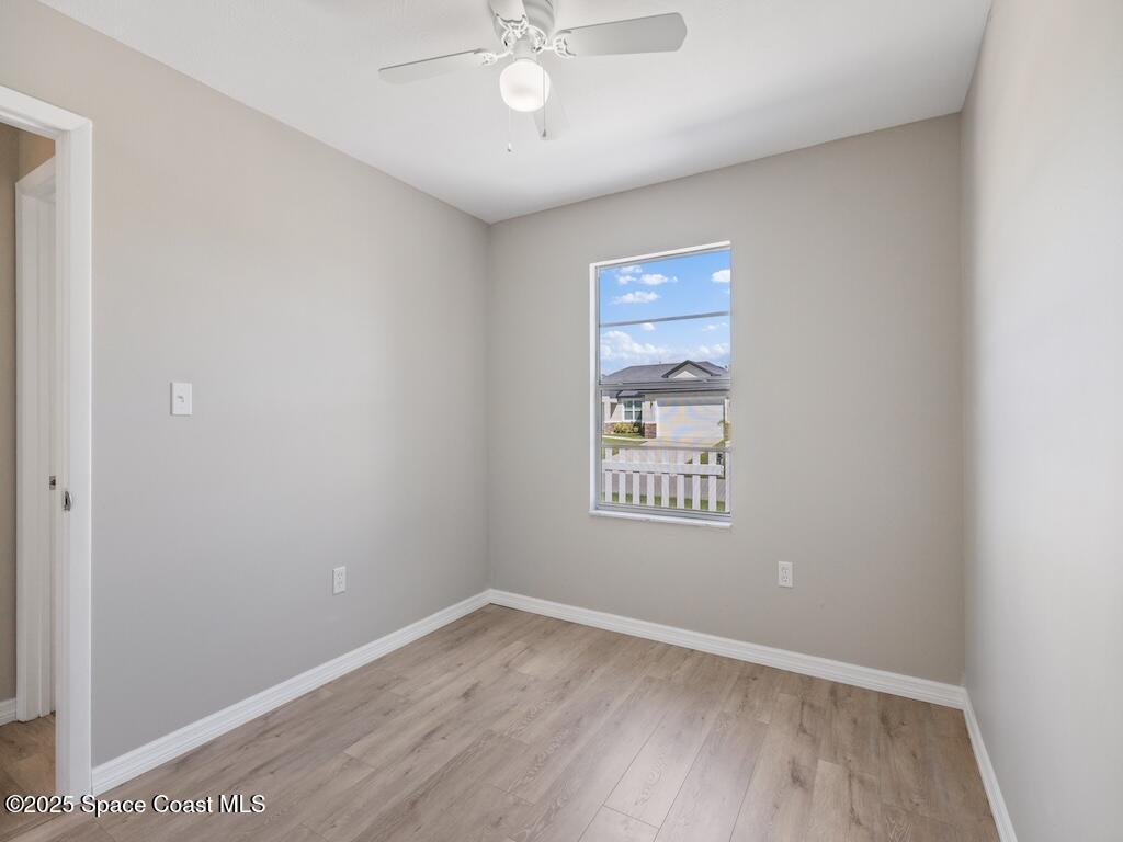 274 Trilby Road Southwest Palm Bay, FL 32908 - Photo 27 of 38 an empty room with a window