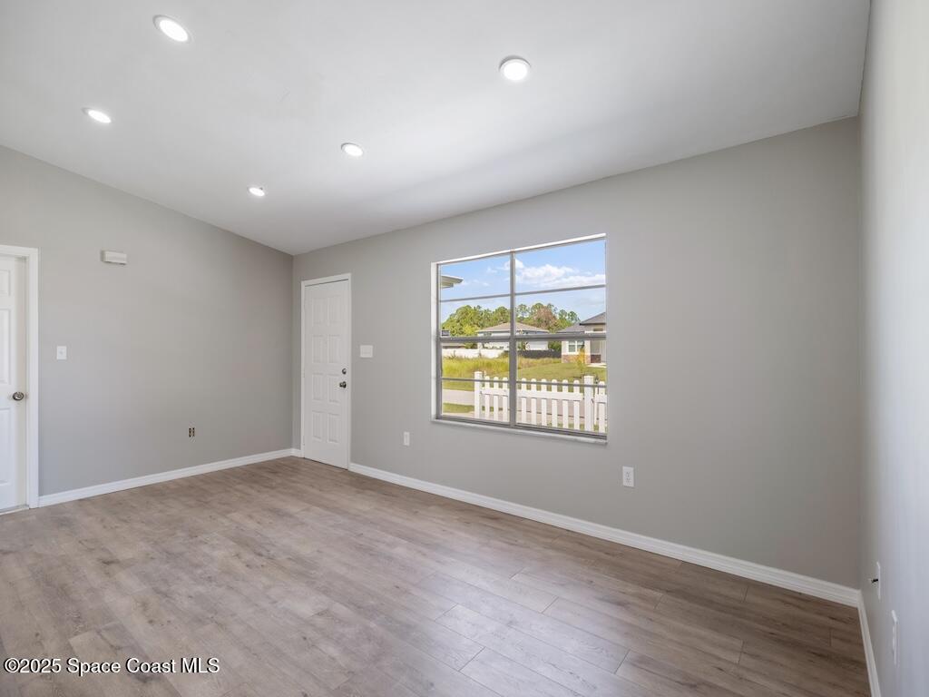 274 Trilby Road Southwest Palm Bay, FL 32908 - Photo 4 of 38 a view of an empty room with a window