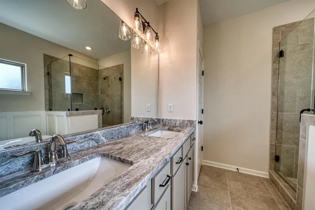 a view of a hallway with closet and cabinet