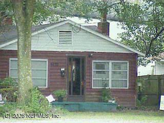 4432 Manchester Road Jacksonville, FL 32210 - Photo 1 of 1 a front view of a house with garden