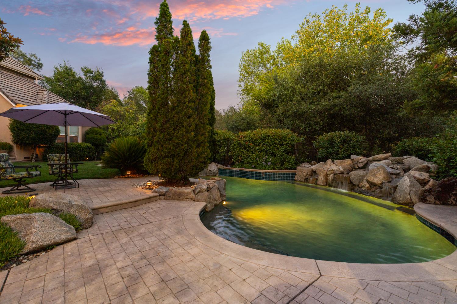 5869 Granite Hills Drive South Granite Bay, CA 95746 - Photo 56 of 66 a view of a swimming pool with lounge chair