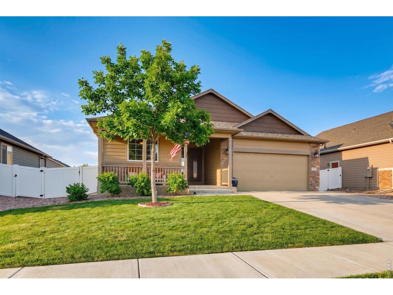 7545 McClellan Road Wellington, CO 80549 - Photo 1 of 42 Enhanced front yard photo with oversized gate on side and Class-4 shingles roof