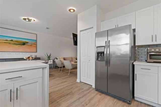 a table and chairs in front of a house