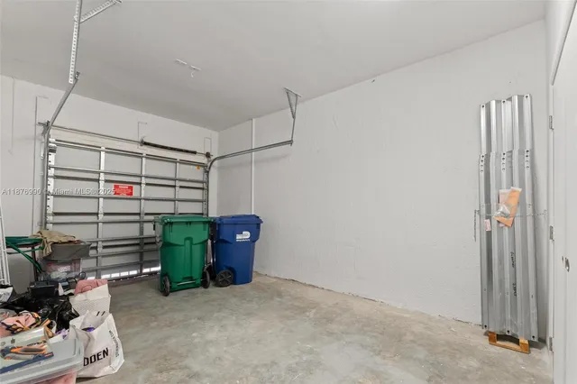 an aerial view of a house with outdoor space