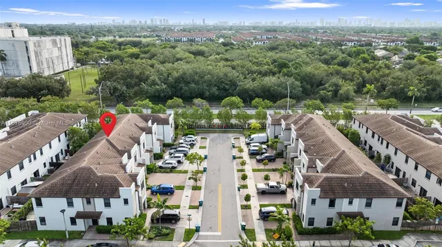 an aerial view of a city and lake view