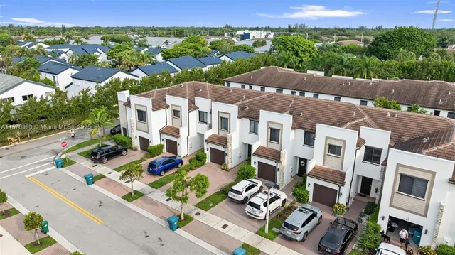 an aerial view of a house with a garden
