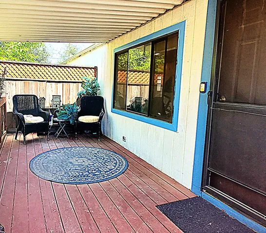 an outdoor space with furniture