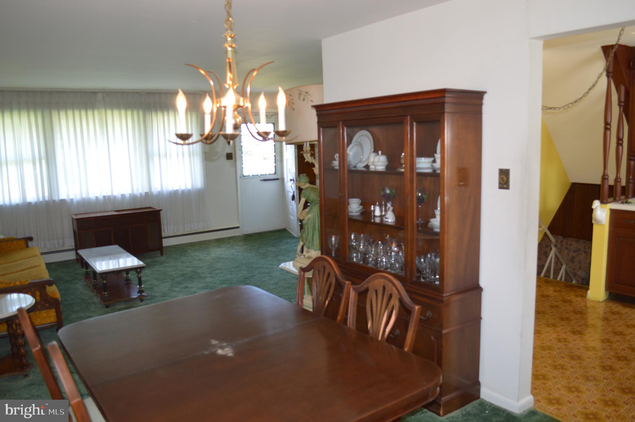 708 Marshall Road Brookhaven, PA 19015 - Photo 4 of 25 dining room showing kitchen entrance