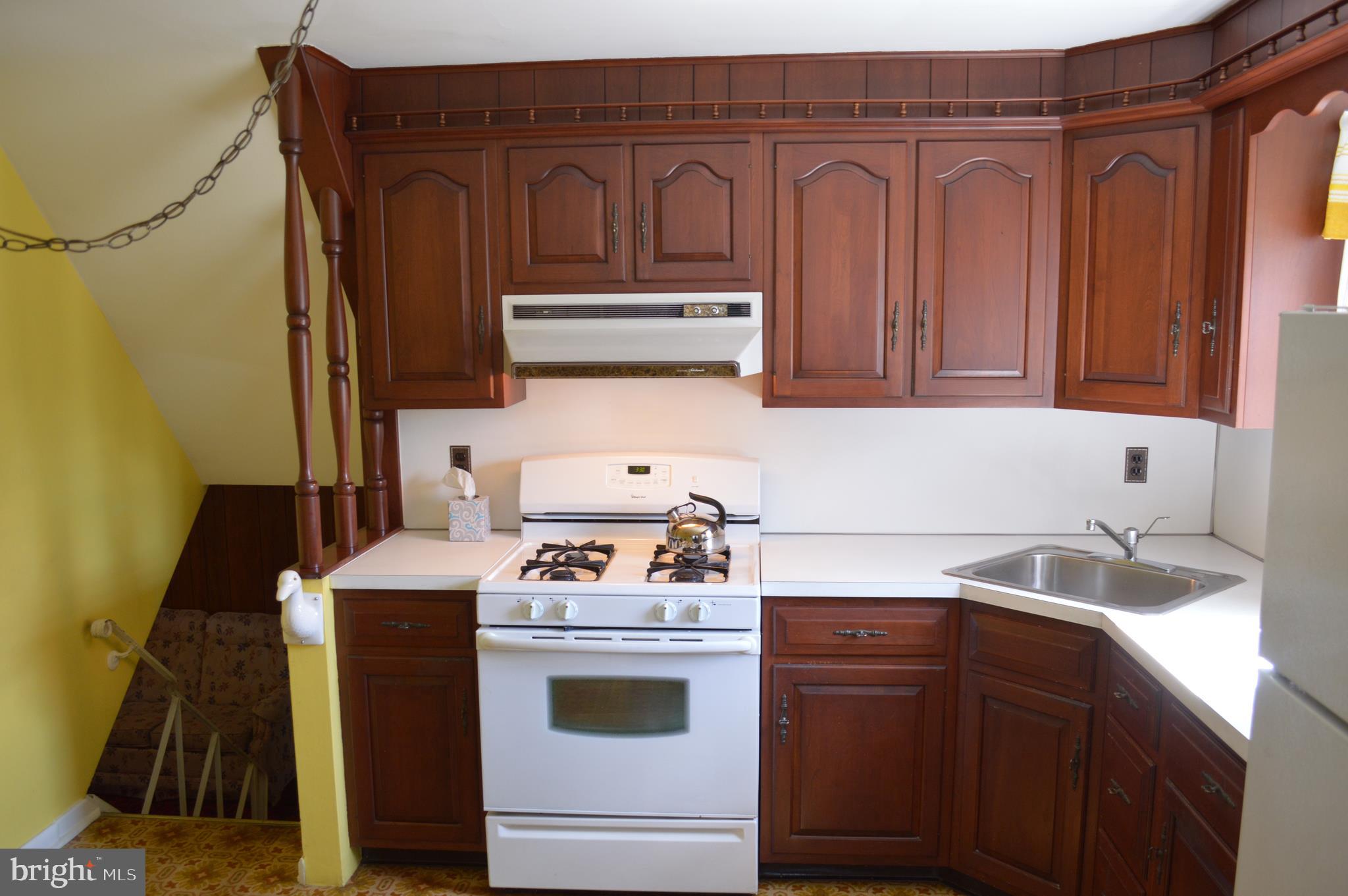 708 Marshall Road Brookhaven, PA 19015 - Photo 9 of 25 Kitchen showing stairs to lower level family room