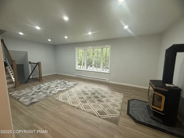 a view of a livingroom with a fireplace