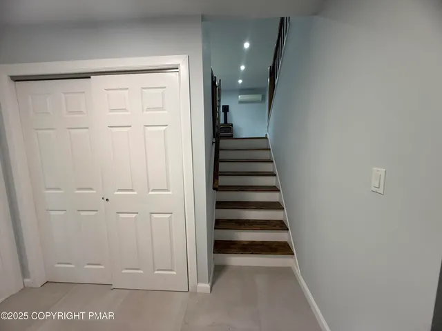 a view of a hallway with entryway