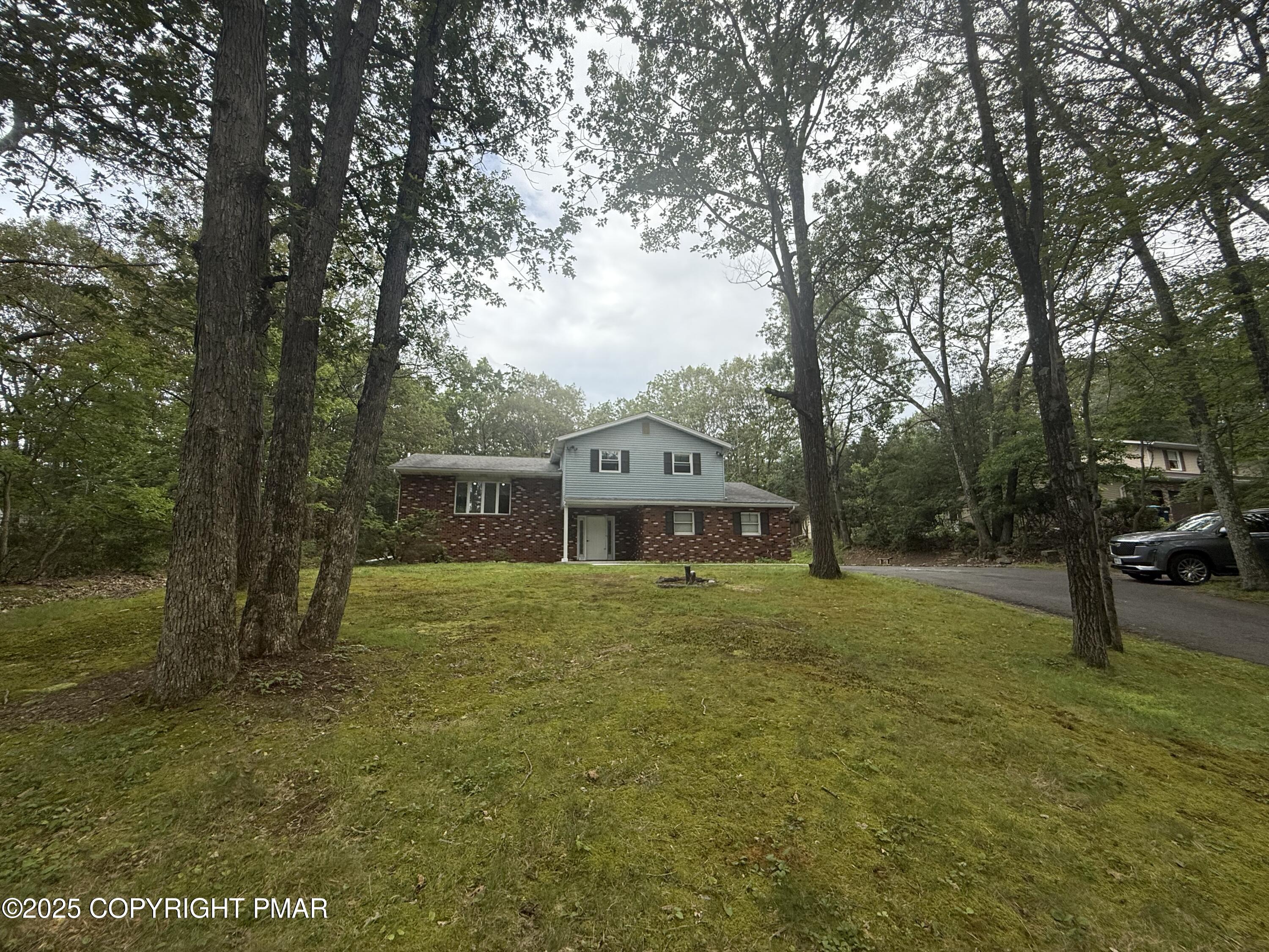 37 Seneca Road Mount Pocono, PA 18344 - Photo 2 of 46 a house view with a outdoor space