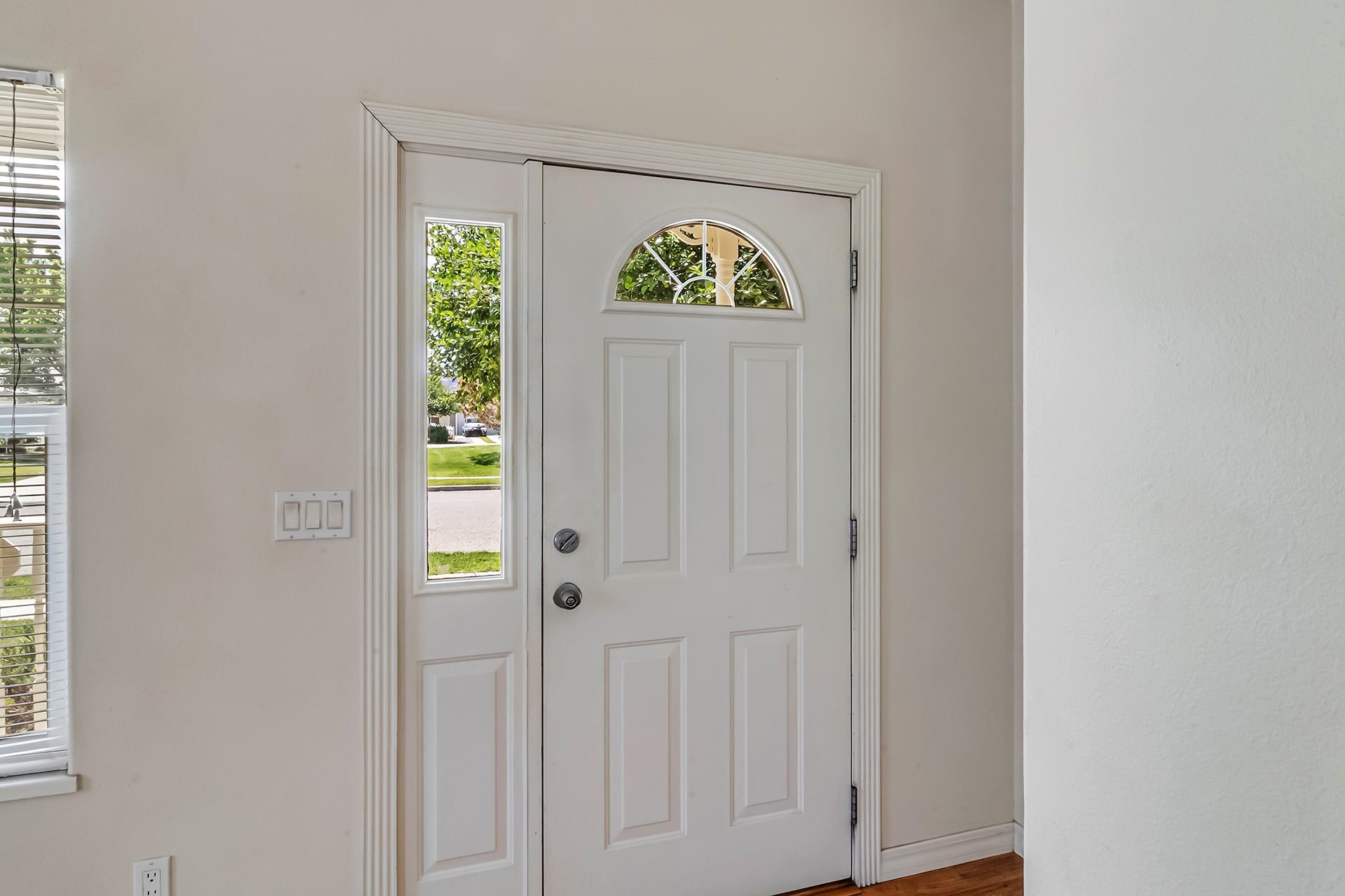 1229 Windsor Park Drive Fruita, CO 81521 - Photo 11 of 36 a view of an entryway with wooden floor