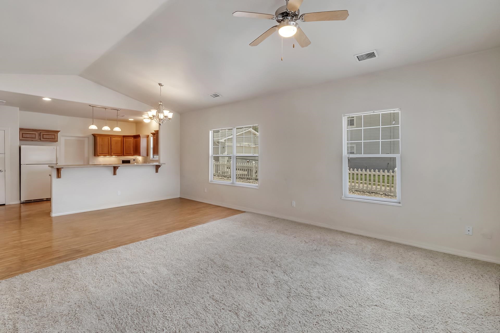 1229 Windsor Park Drive Fruita, CO 81521 - Photo 12 of 36 a view of an empty room with a window and fireplace