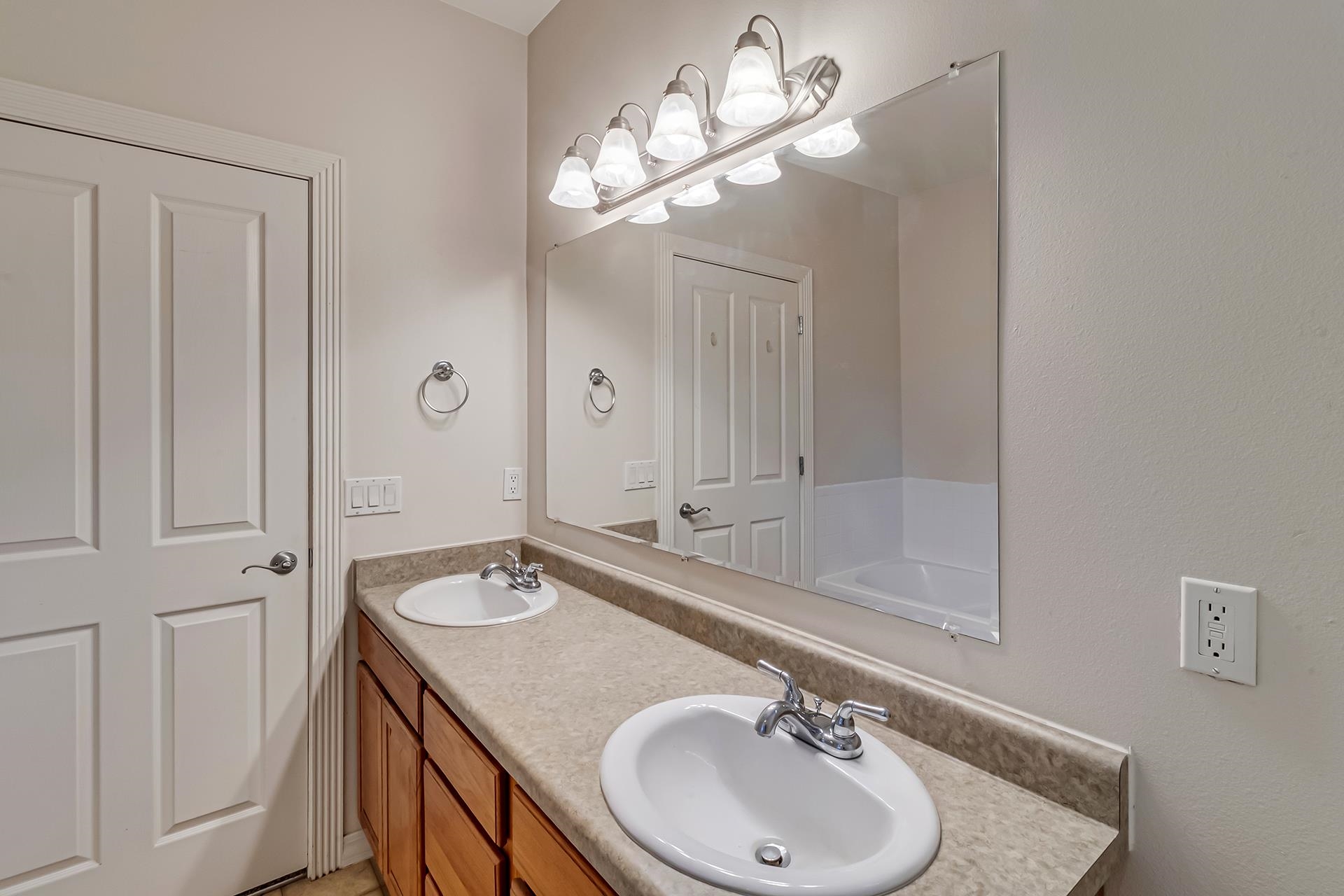 1229 Windsor Park Drive Fruita, CO 81521 - Photo 27 of 36 a bathroom with a sink and a mirror