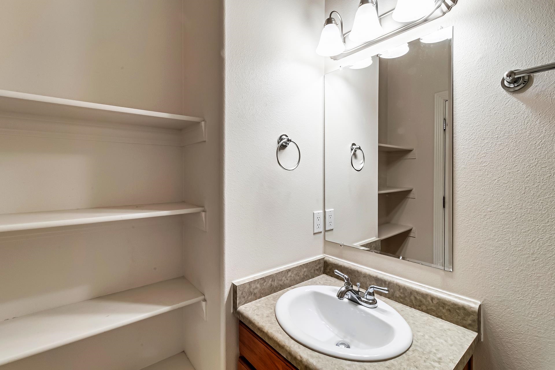 1229 Windsor Park Drive Fruita, CO 81521 - Photo 31 of 36 a bathroom with a sink a toilet and shower
