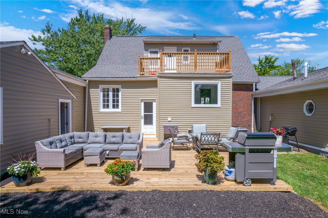 311 Hillside Road Independence, OH 44131 - Photo 39 of 46 Back of house featuring outdoor lounge area, a wooden deck, and a balcony