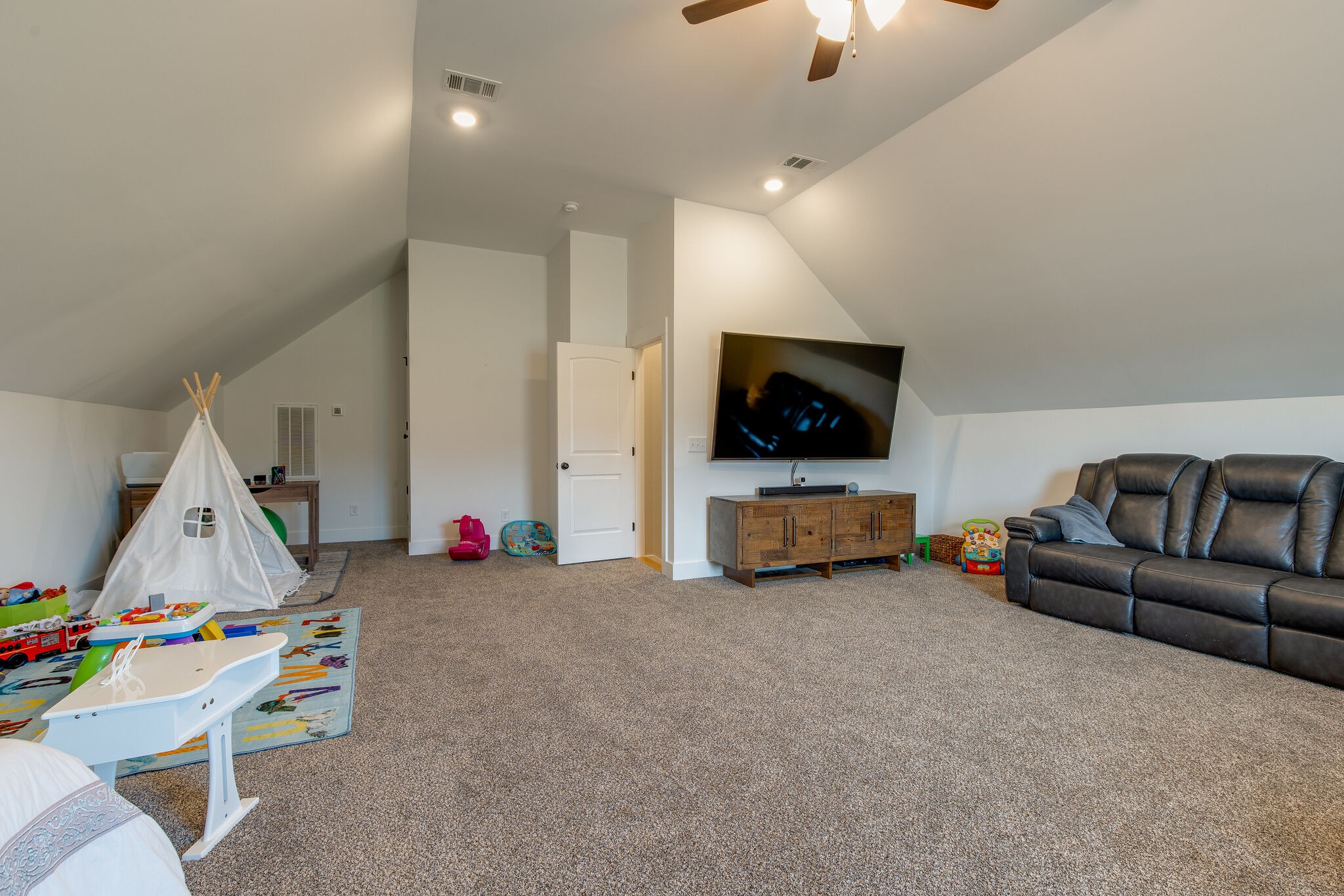 3188 Battle Creek Road Springfield, TN 37172 - Photo 26 of 49 a living room with furniture and a flat screen tv