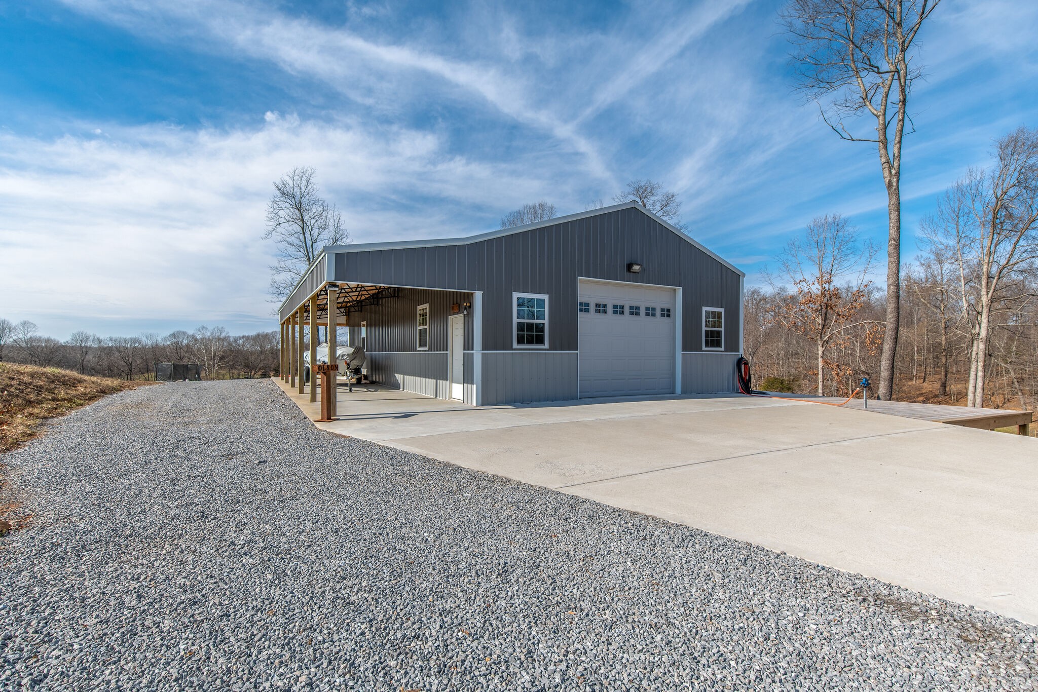 3188 Battle Creek Road Springfield, TN 37172 - Photo 32 of 49 a front view of a house with a yard and garage