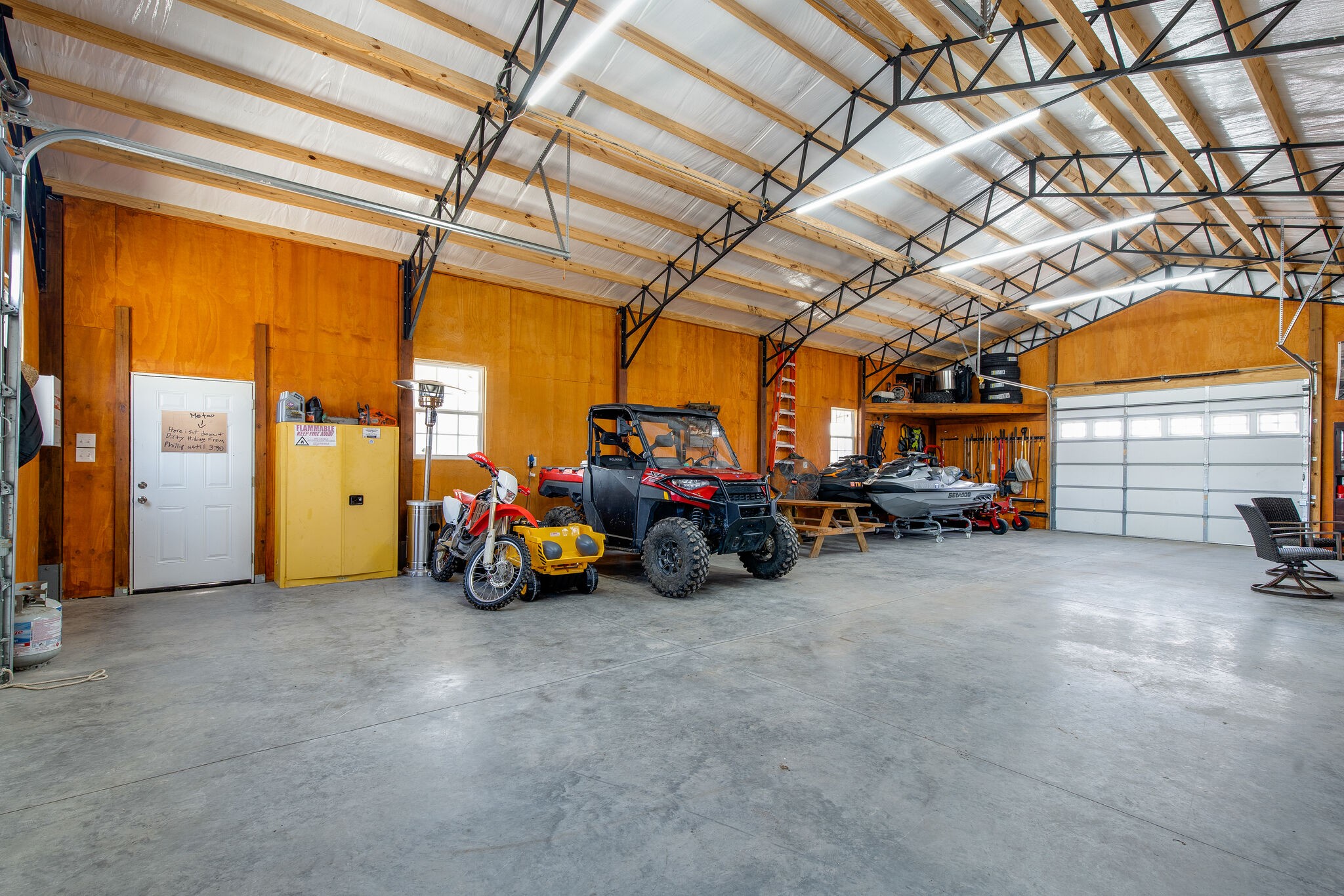 3188 Battle Creek Road Springfield, TN 37172 - Photo 36 of 49 a view of a garage with parked cars