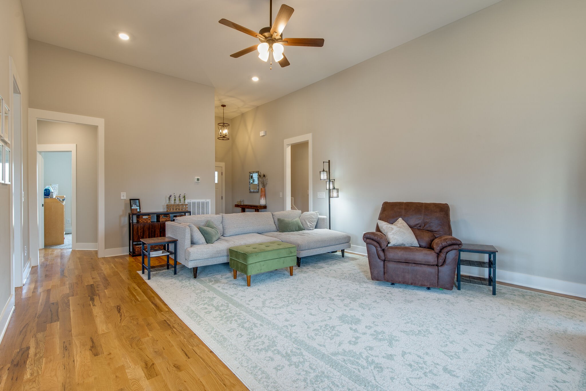 3188 Battle Creek Road Springfield, TN 37172 - Photo 6 of 49 a living room with furniture and a chandelier