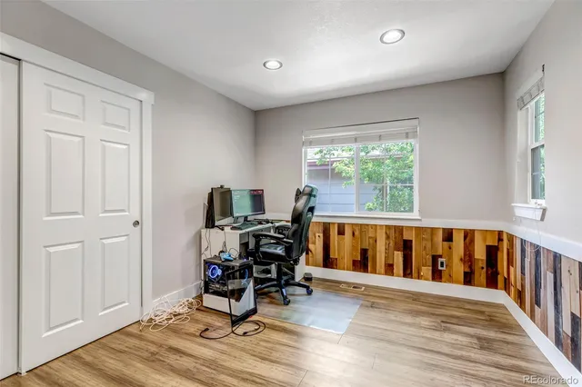 a view of a livingroom with an empty space and a window