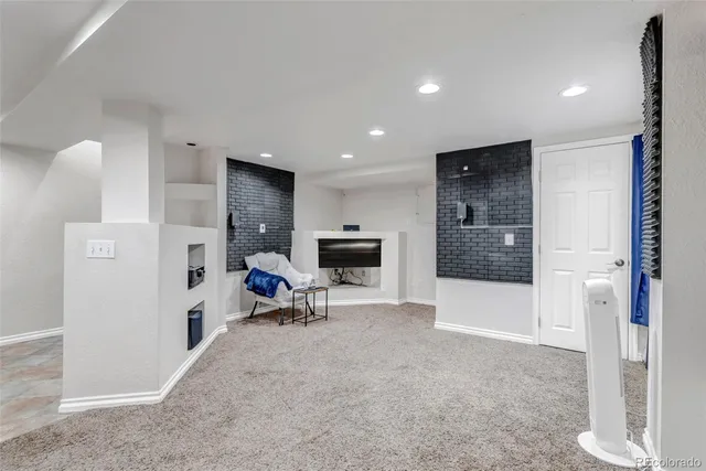 a living room with furniture and a couch